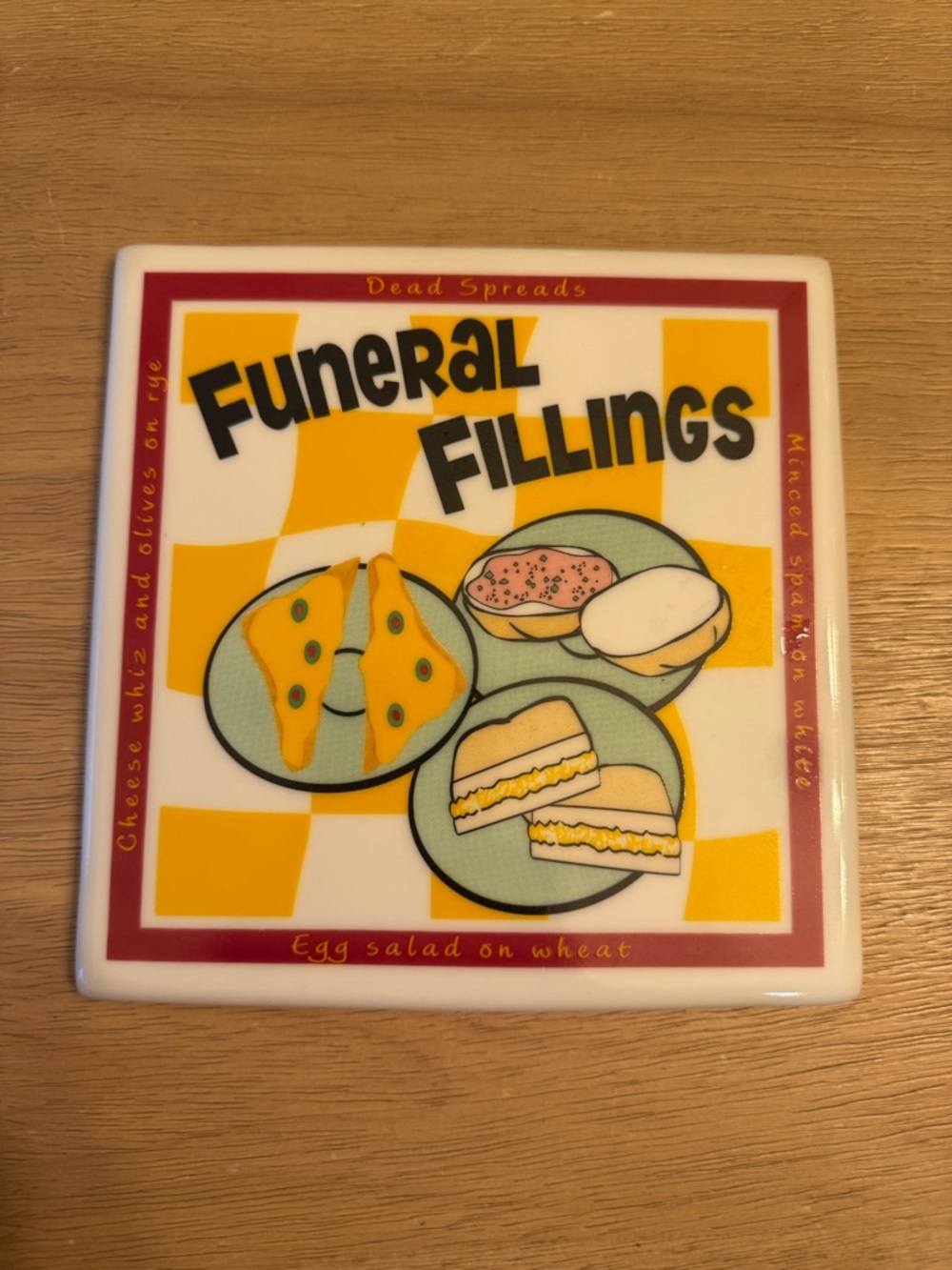 Vintage 90’s humorous kitchen “funeral food” ceramic trivet